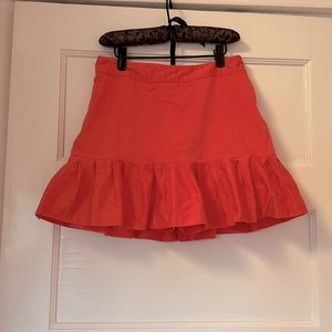 Peach golf skort with ruffles , From Lady Hagen very comfortable